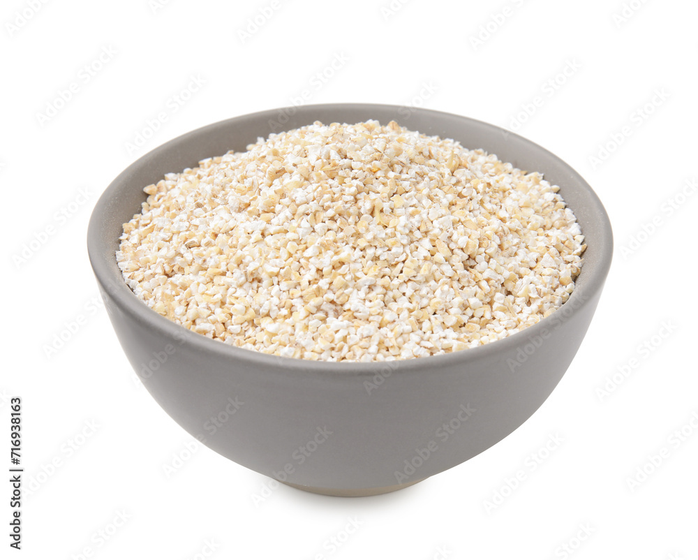 Dry barley groats in bowl isolated on white Dry barley groats in bowl isolated on white