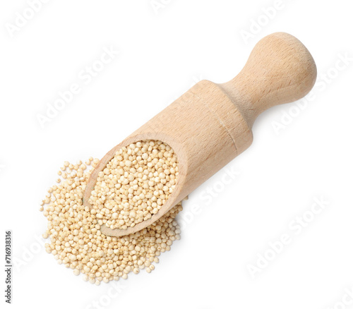 Wooden scoop with raw quinoa isolated on white, top view