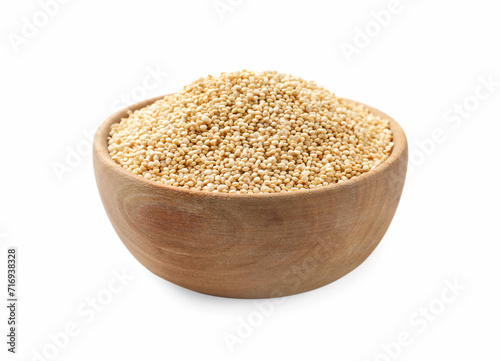 Raw quinoa in wooden bowl isolated on white
