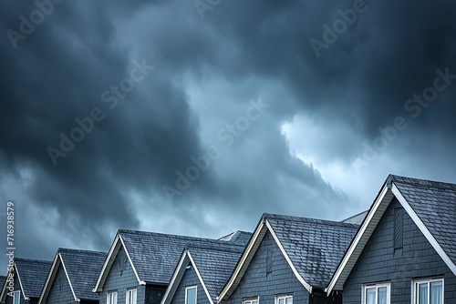 Storm clouds form over the houses 