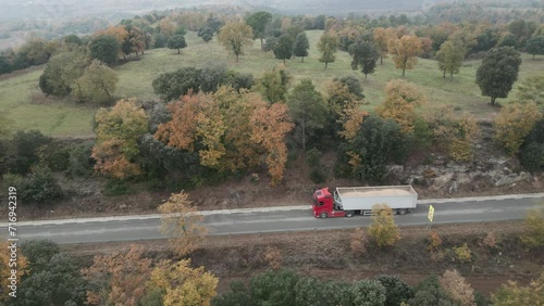 Freight Truck on Countryside Road - Commercial Transport in Natural Surroundings
