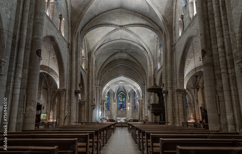 Interior of Saint-Pierre de Montmartre Church in Paris. View of the nave and gothic rib vault ceiling at the Paroisse Saint Pierre de Montmartre or the Church of Saint Peter of Montmartre, France.