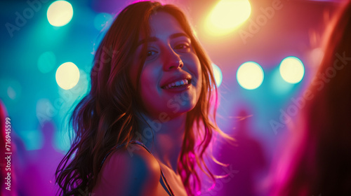 Neon Groove: Captivating Moves of an Attractive Young Woman on the Dance Floor