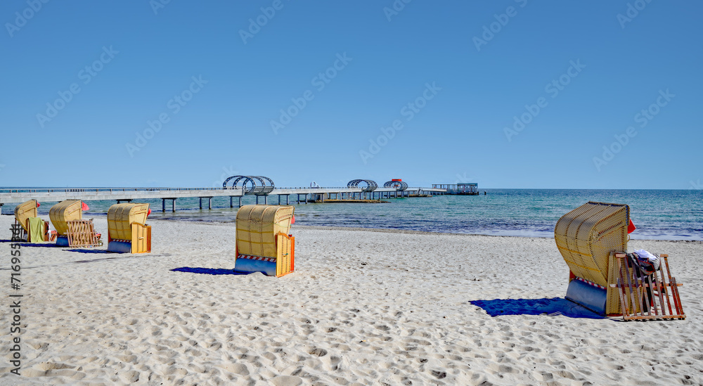 Beach and Pier in Seaside Resort of Kellenhusen,baltic Sea,Schleswig-Holstein,Germany - obrazy, fototapety, plakaty 