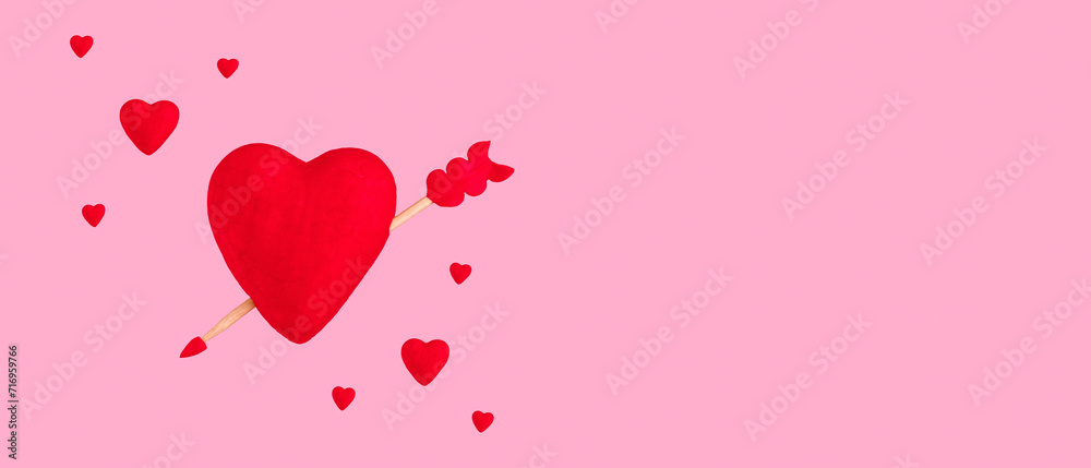 Red hearts on pastel pink background. Wide banner. Copy space.