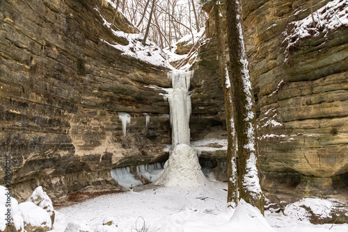 Frozen waterfall in St. Louis canyon on a very cold winters morning.  Starved Rock State Park, Illinois, USA. photo