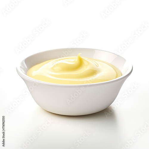 Delicious vanilla custard in a bowl isolated on white background, Tasty vanilla pudding in ramekin and flower