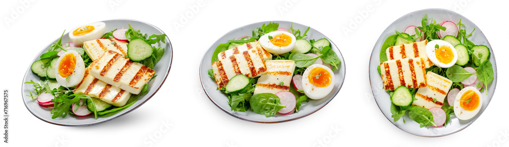 Healthy Ketogenic Paleo Meal, Grilled Halloumi with Lettuce, Radish, Cucumber, and Boiled Egg on White Background Healthy Ketogenic Paleo Meal, Grilled Halloumi with Lettuce, Radish, Cucumber, and Boiled Egg on White Background
