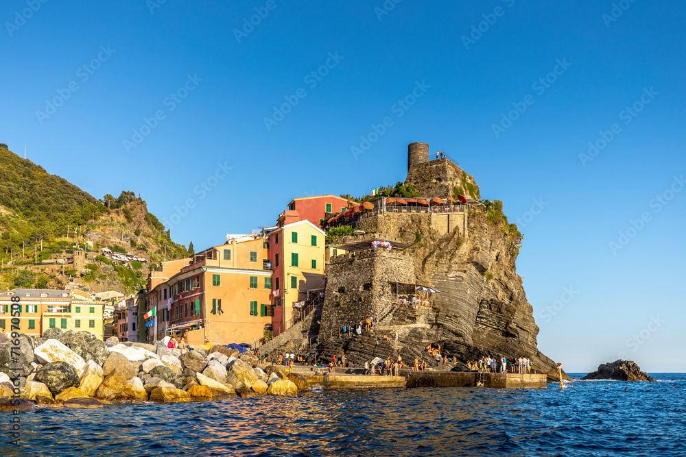 Vernazza, Italy - August 1st, 2023: View of Vernazza village, one of the cinque terre, by the sea, in Italy