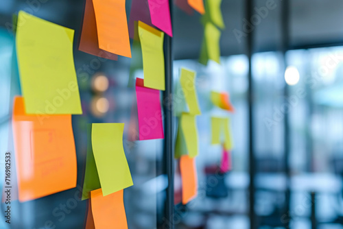 Colorful Sticky Notes Used By Business People To Share Ideas In Meeting