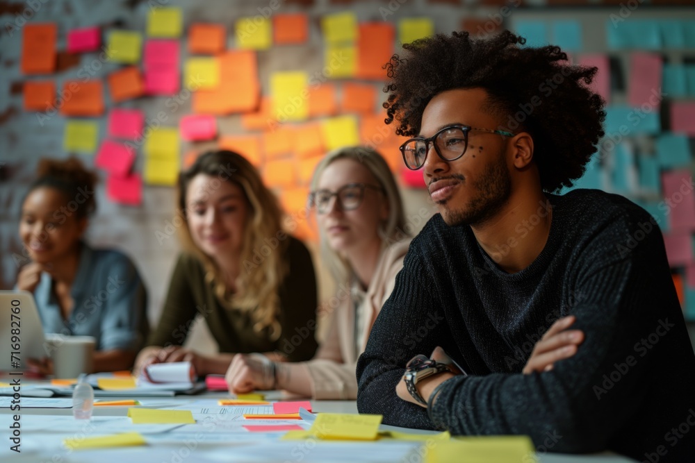 Diverse Professionals Brainstorm Ideas Together, Utilizing Schedules, Sticky Notes, And Innovation Diverse Professionals Brainstorm Ideas Together, Utilizing Schedules, Sticky Notes, And Innovation