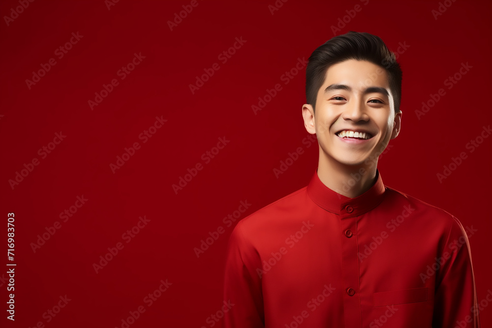 Obraz premium portrait of a man wearing red Chinese clothing to commemorate Chinese New Year with generative ai
