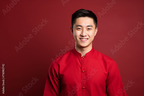 portrait of a man wearing red Chinese clothing to commemorate Chinese New Year with generative ai © MUdaylah