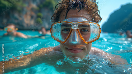 man snorkeling in crystal clear tropical sea © ProstoSvet