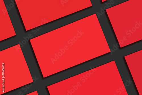 Mockup of horizontal red business cards stacks arranged in rows at Black textured paper background.