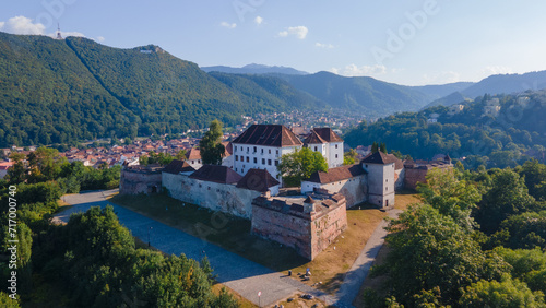 Landscape photography of the modern star shaped fortification in Brasov, Romania. Photography was taken from a drone at a lower altitude with camera level for a panoramic still of the bastion.