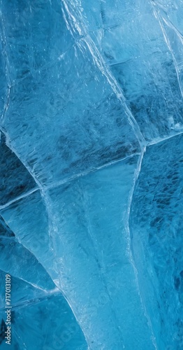 Texture of cracked ice  blue color. Design concept  for winter products. abstract background winter ice transparent blue. Top view with space for text.