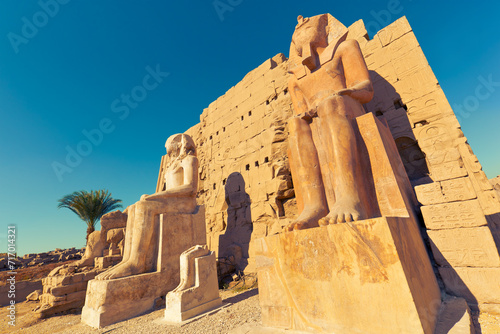 Statues of seated pharaohs. The Precinct of Amun-Re  the Karnak Temple  Luxor  Egypt