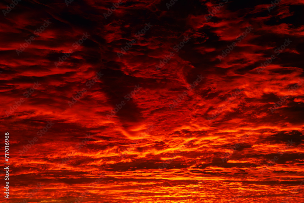 Red and orange clouds at sunrise or sunset. Red and orange clouds at sunrise or sunset.