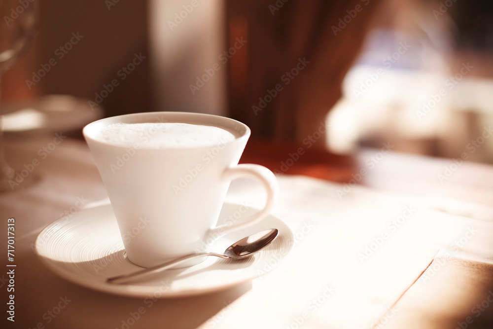 Cup of coffee on cafe table