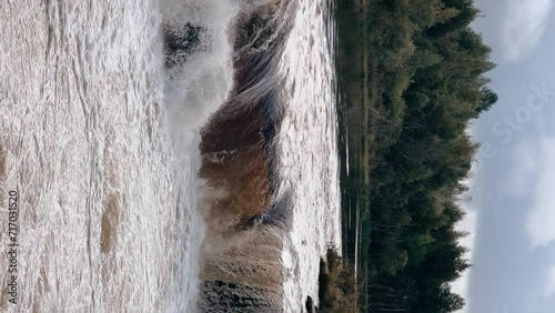 Voytsky padun waterfall in autumn. The famous powerful and wide Karelian waterfall Voytsky Padun is surrounded by rocks and greenery. Cascading waterfall on the river. Karelia, Russia 4K photo