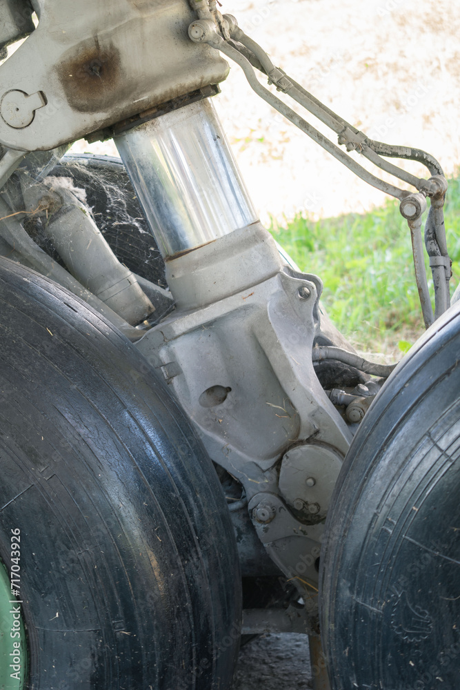 Aircraft chassis. Hull, chassis, engines and propellers of an old plane. large, cargo, military