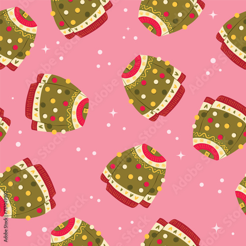 Cute vibrant hand drawn sweater with winter decoration and pom-poms seamless pattern. Colorful holiday vector illustration on pink background. Vibrant repeat design.