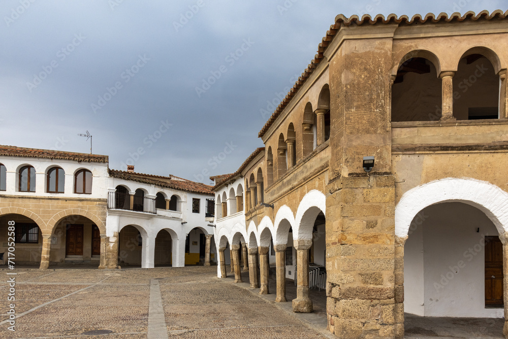 A part of the spectacular main square of Garrovillas de Alconétar. The square is made up of perfectly whitewashed houses with generous arcades. Cáceres, Spain
