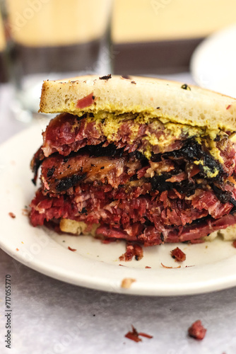 Sandwich with pastrami and mustard 