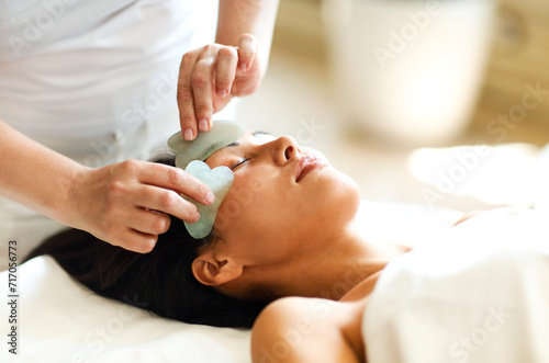 Face massage or beauty treatment in spa salonFace massage or beauty treatment in spa salon