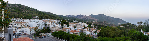 Panoramic night view of white houses in Mijas, Spain