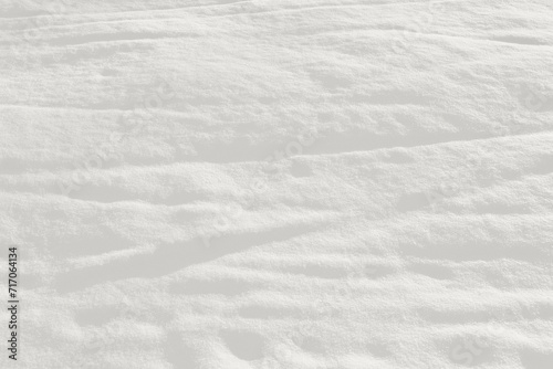 Only white snow, full frame. Texture of snow close-up. Pure snowy surface. photo