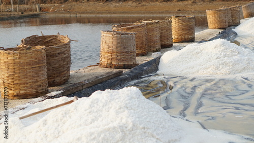 The process of making salt, in a salt evaporation pond in Jepara, Central Java, Indonesia