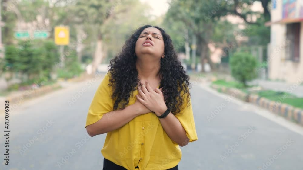 Indian Girl with Curly Hair Having Heart Attack