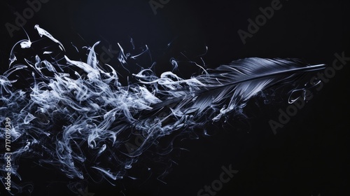 Blue feather on dark textured background. Copy space for your text. A quill pen suspended mid-air, leaving behind an intricate stanza composed of swirling ink trails.  photo