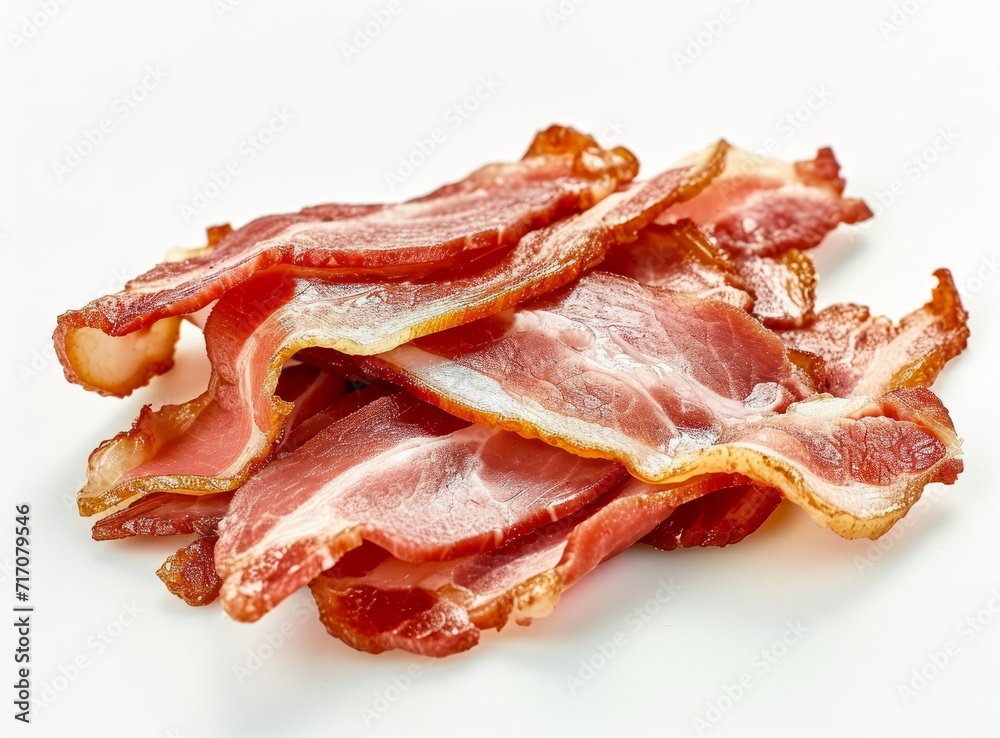 Slices of smoked bacon isolated on white background. Slices of smoked bacon isolated on white background.