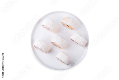 Ham Cheddar cheese cream cheese pinwheel on a white isolated background