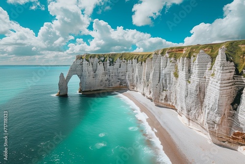 Picturesque panoramic landscape on the cliffs of Etretat. Natural amazing cliffs. Etretat, Normandy, France, La Manche or English Channel. Coast of the Pays de Caux area in sunny summer day. France