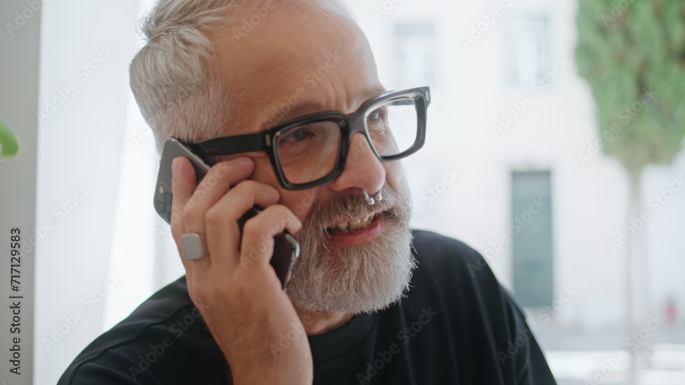 Stylish man chatting smartphone closeup. Handsome senior ending call working Stylish man chatting smartphone closeup. Handsome senior ending call working