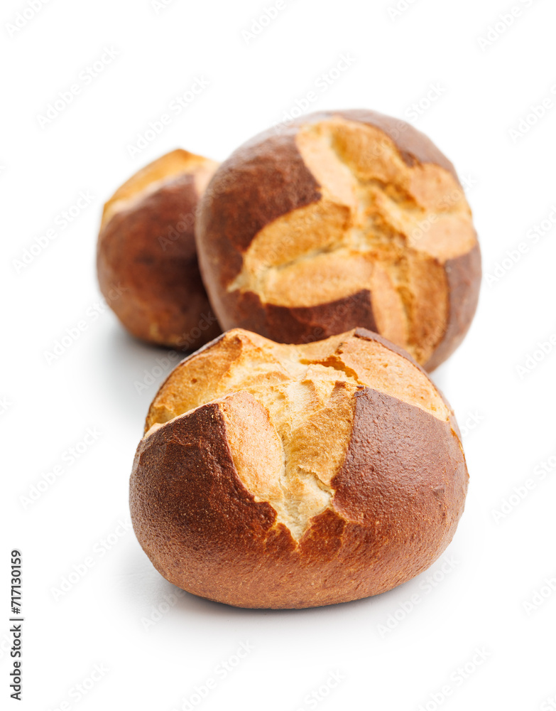 Homemade baked buns isolated on white background. Homemade baked buns isolated on white background.