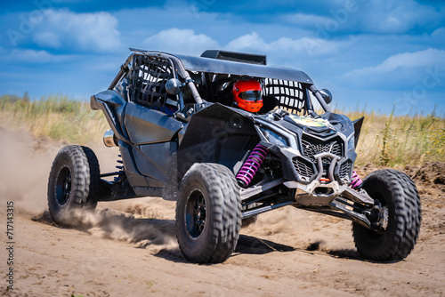 UTV buggy offroad vehicle racing on sand. Extreme  adrenalin. 4x4.