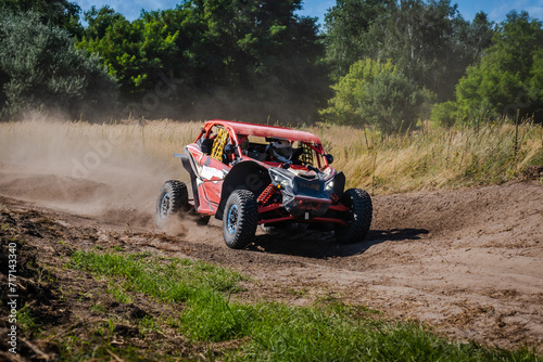 ATV and UTV riding in sandy dusty track. Amateur competitions. 4x4.