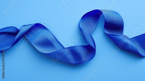 Flowing blue ribbon on a blue background