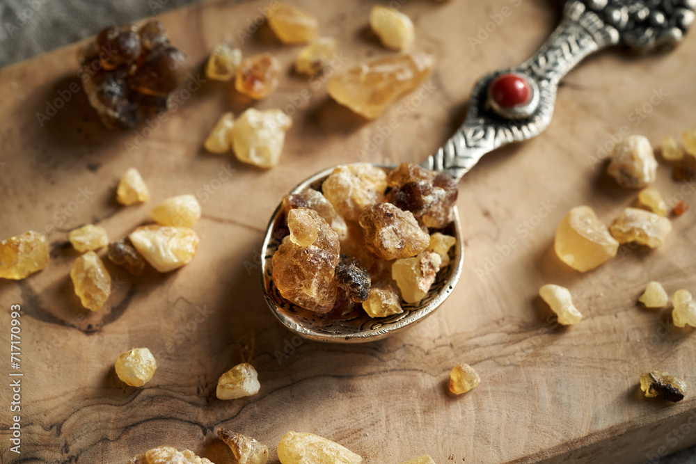 Fototapeta premium Frankincense resin crystals on a spoon, closeup