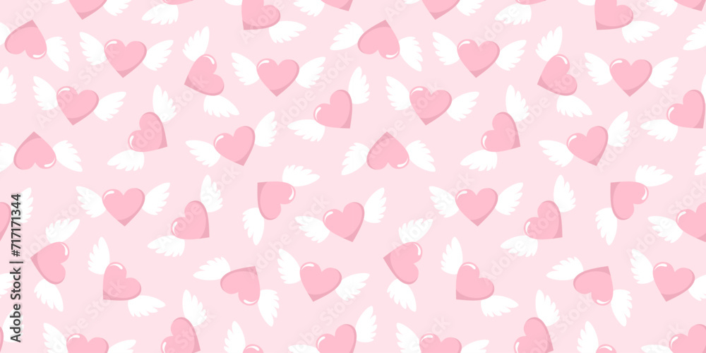 Pink seamless pattern with winged hearts. Flat vector illustration