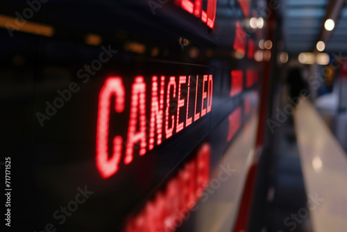 Flights canceled or delayed on information board in an airport