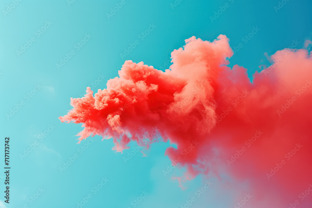Fotografie Red smoke on a blue sky background