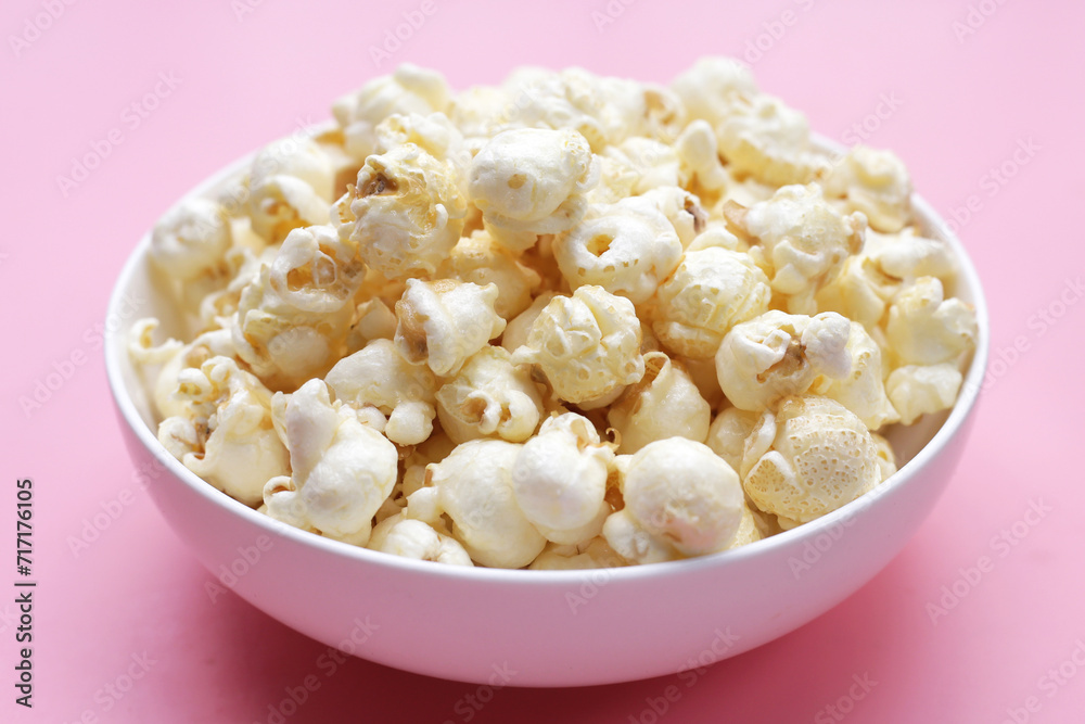 Sweet popcorn on pink background. Sweet popcorn on pink background.