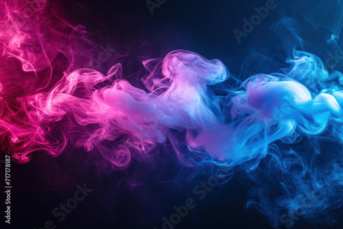Thick colorful smoke of blue  pink in the form of a skull  monster  dragon on a black isolated background. Background from the smoke of vape