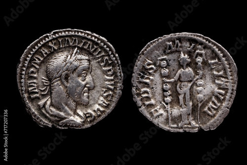 Roman coin, AR Denarius,Maximinus, Rome mint, 236-238 AD., ,Ancient roman coin with portrait of emperor isolated on black